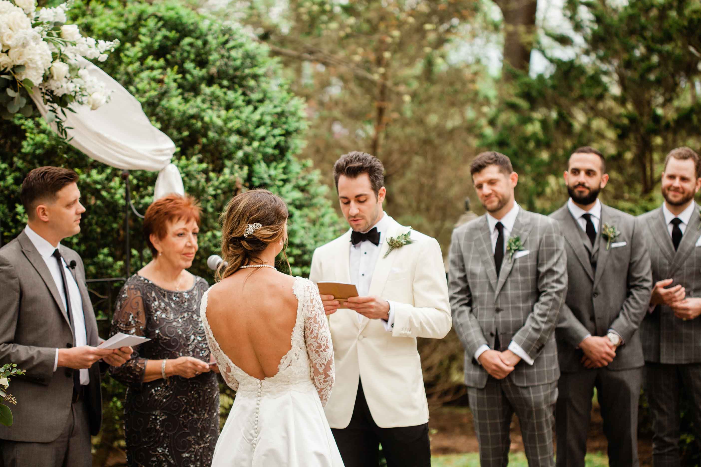 vows, altar, wedding party, officiant, garden wedding